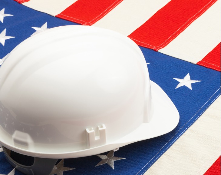 White hardhat on American flag